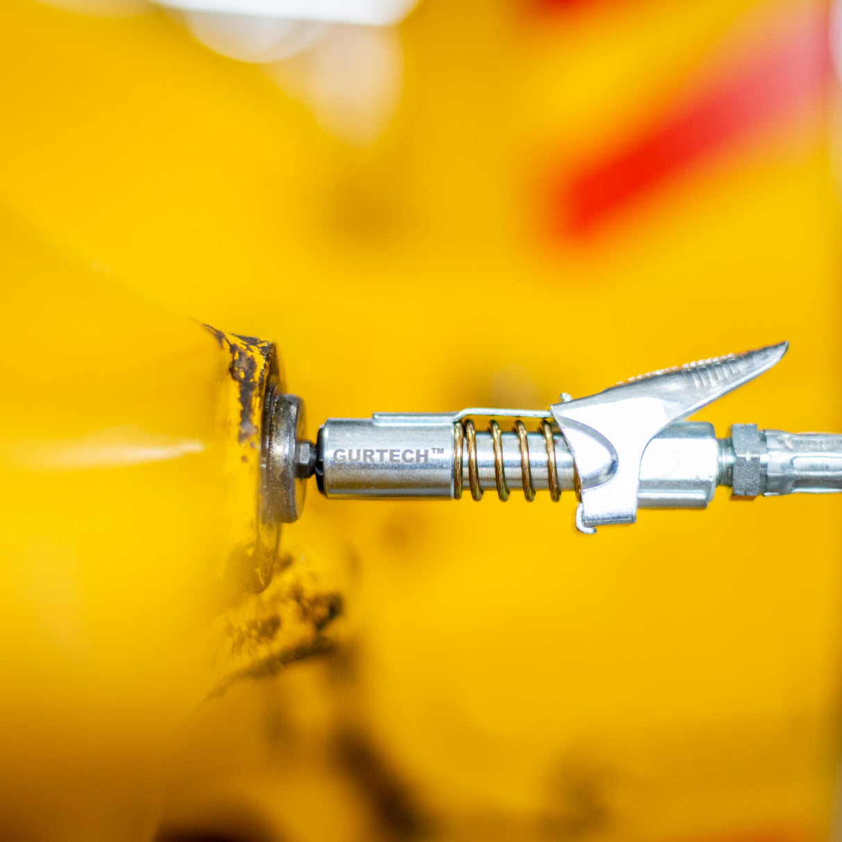 Låsebar hurtigkobling for fettpresse