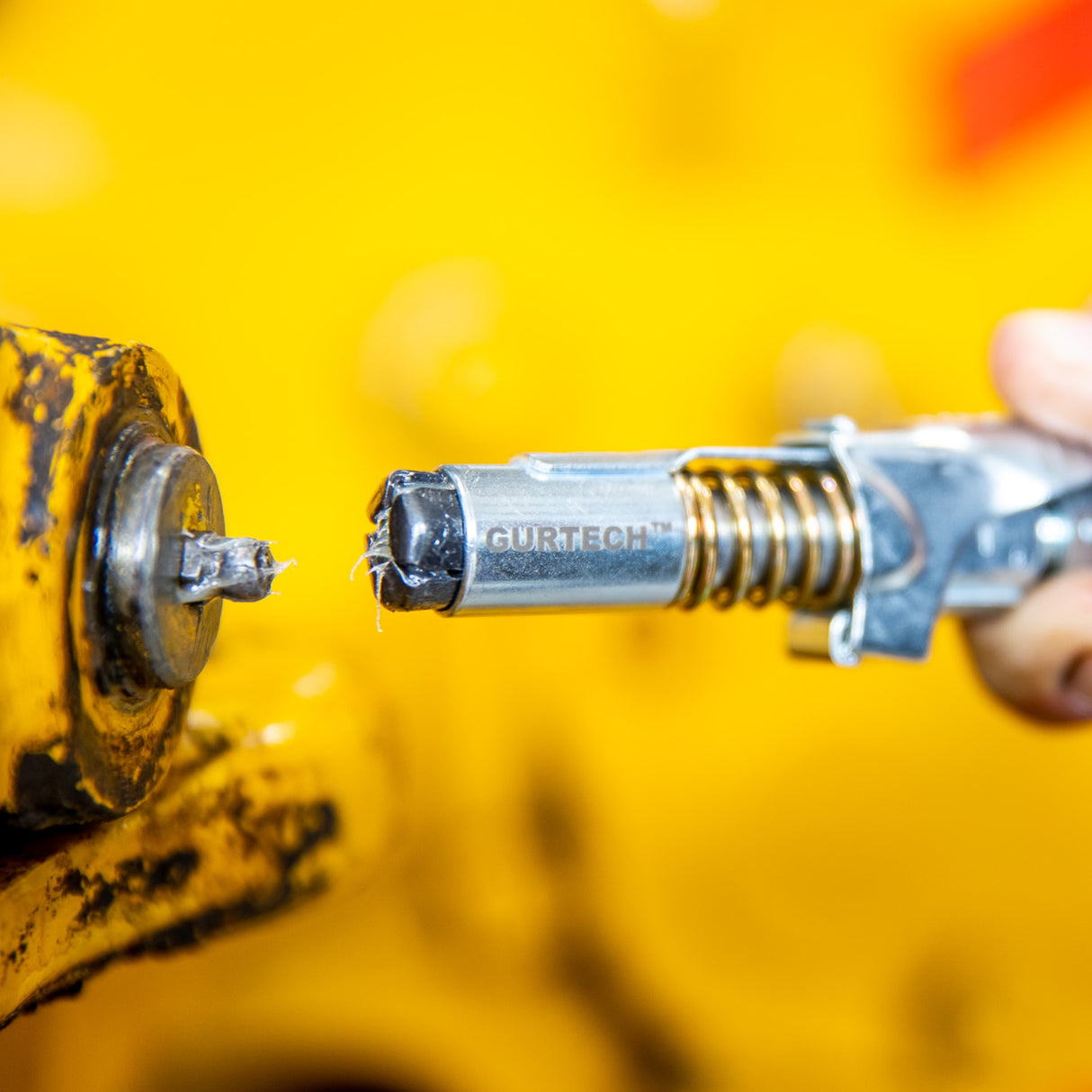 Låsebar hurtigkobling for fettpresse